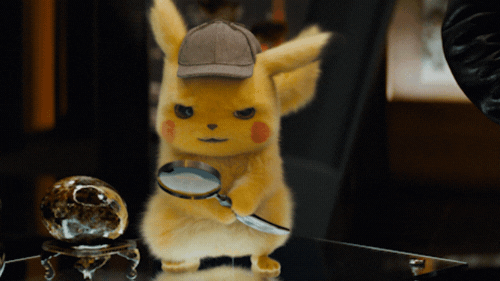 Détective Pikachu avec une loupe