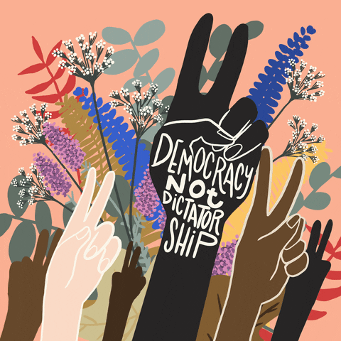 Des mains se lèvent et font le signe de paix